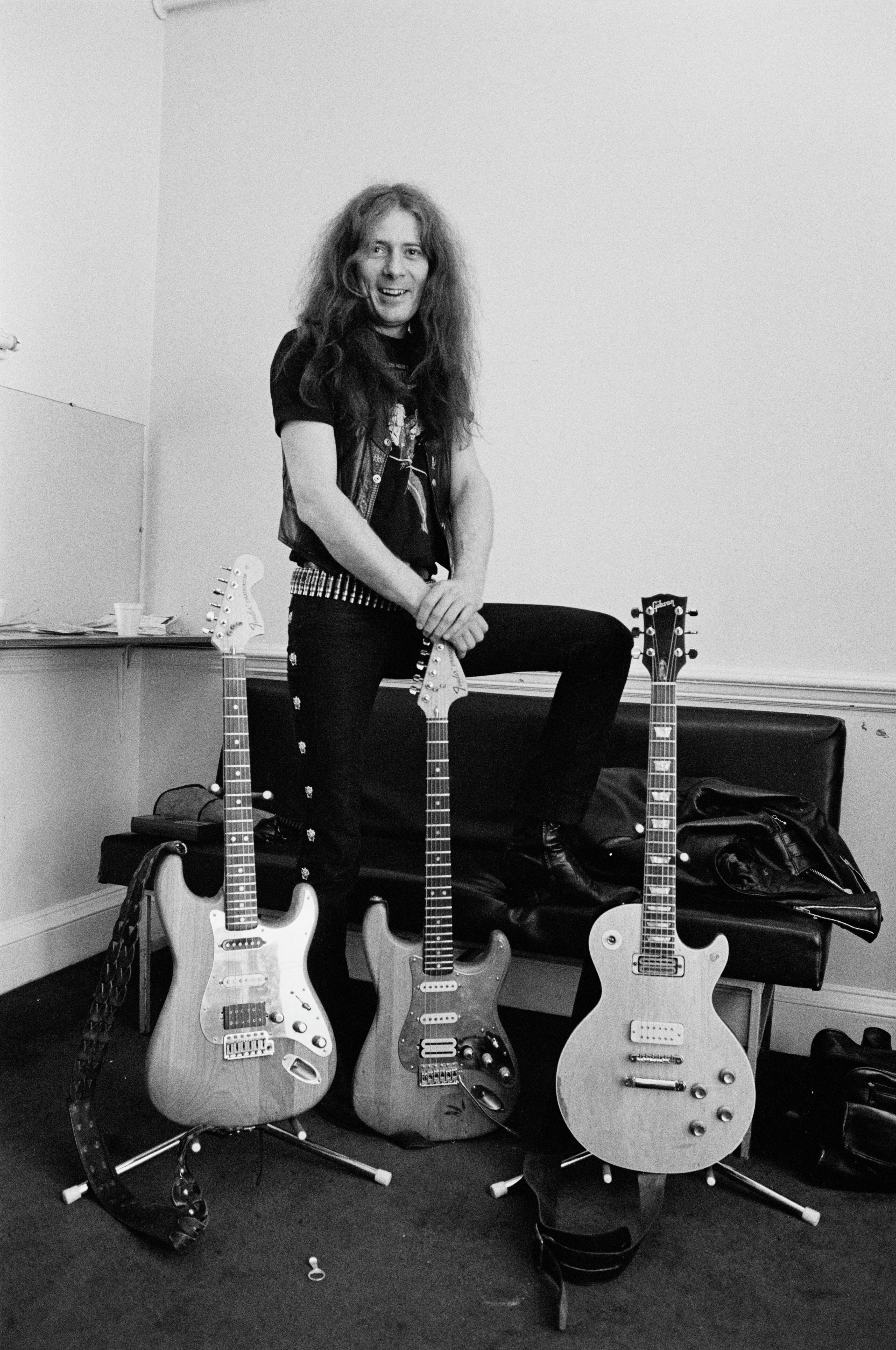 Original Motorhead Guitarist 'Fast' Eddie Clarke Dead At 67 | iHeartRadio